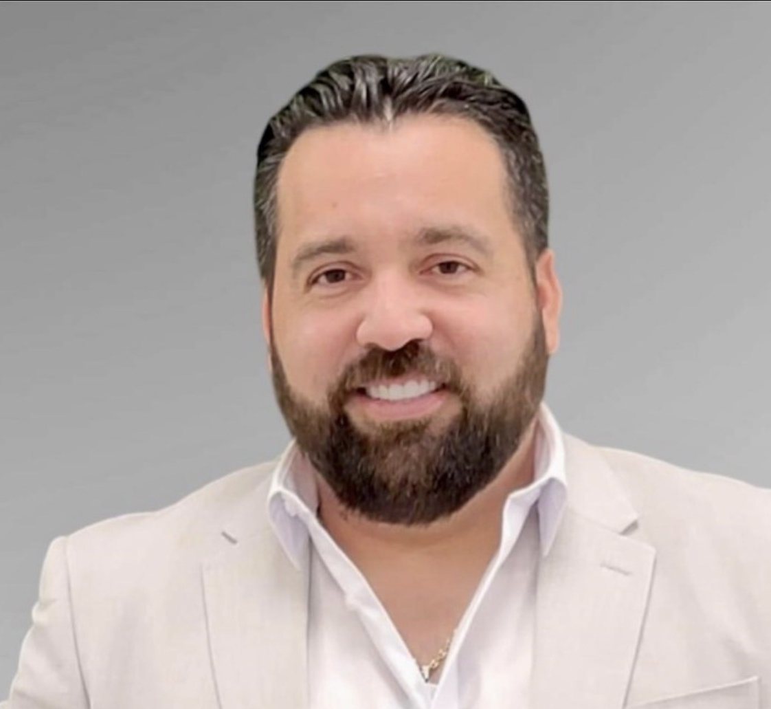 Carlos Leras, portrait in a light blazer